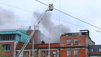 Firefighters continue to work on fire at IPAS centre in Dublin city