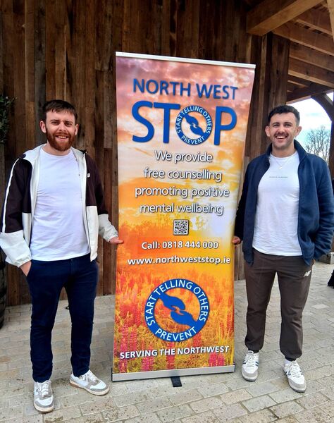 Proud brother Tadhg Guihen pictured with his brother Fergal who completed a global charity cycle raising over €210,000 for two local charities, Mayo Roscommon Hospice Foundation and North West Stop. Pic: Noreen Gaffney 