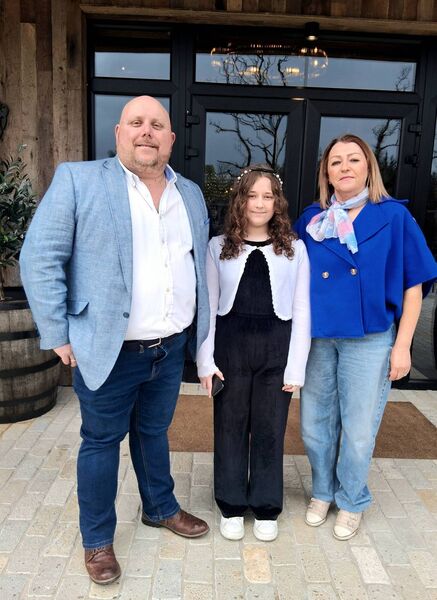 MC John Lynch pictured at Drumhierny Woodland Hideaway with his wife Rose Mulvihill-Lynch and daughter Rose. Pic: Noreen Gaffney 