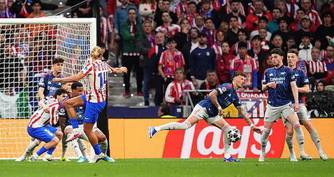 Penalty drama at both ends as Arsenal draw at Atletico Madrid