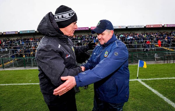 LEAVE IT THERE: Donegal manager, Jim McGuinness, congratulates Mark Dowd following the Rossies' crucial six-point victory against the Ulster side in mid-March at King and Moffatt Dr. Hyde Park. Picture: INPHO/Ryan Byrne