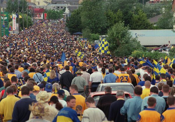 ROSSIE POSSE: Roscommon supporters make their way down the Athlone Road after leaving Dr. Hyde Park in the aftermath of a dramatic 2001 Connacht senior football final against Mayo. Picture: INPHO/Morgan Treacy ROSSIE POSSE: Roscommon supporters make their way down the Athlone Road after leaving Dr. Hyde Park in the aftermath of a dramatic 2001 Connacht senior football final against Mayo. Picture: INPHO/Morgan Treacy