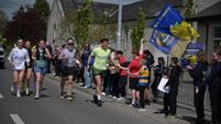 WATCH: Roscommon wraps its arms around brothers running for a cure 