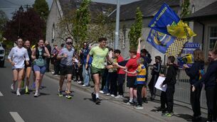 <p>There was massive support for Jordan and Cian Adams when they ran a marathon in Roscommon today, Tuesday. Picture shows runners passing Kilteevan NS. Pic: Breda Durr </p>
