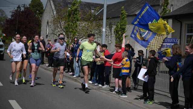 WATCH: Roscommon wraps its arms around brothers running for a cure 