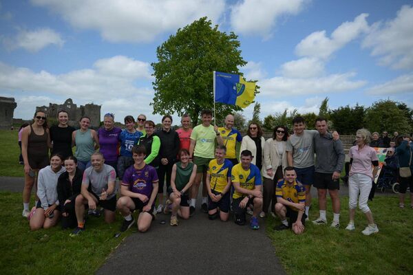 Jordan and Cian Adams, who are on a mission to run 33 marathons in 33 days to raise money to help fight dementia, pictured with supporters in Roscommon on Tuesday. Pic: Breda Durr Jordan and Cian Adams, who are on a mission to run 33 marathons in 33 days to raise money to help fight dementia, pictured with supporters in Roscommon on Tuesday. Pic: Breda Durr