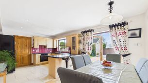 <p>The open plan kitchen and dining area is bright and spacious, overlooking the rear garden. </p>