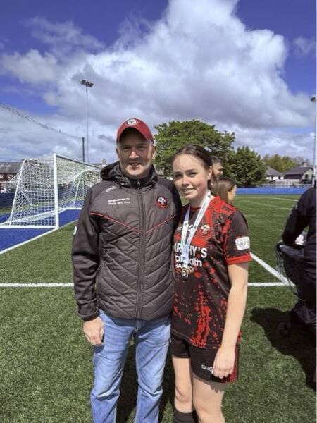 Ruby Rushe and proud Dad Gerry celebrate Ballaghaderreen senior ladies Connacht Shield win at McSharry Park. Ruby Rushe and proud Dad Gerry celebrate Ballaghaderreen senior ladies Connacht Shield win at McSharry Park.