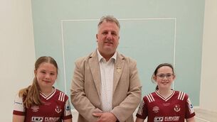 <p>Caitlín Smyth and Grace Connaughton, both Williamstown Handball Club, who finished runners-up in the 13 &amp; U Doubles 60x30 National Championships. They are pictured with GAA Handball President Kevin Cooke.</p>