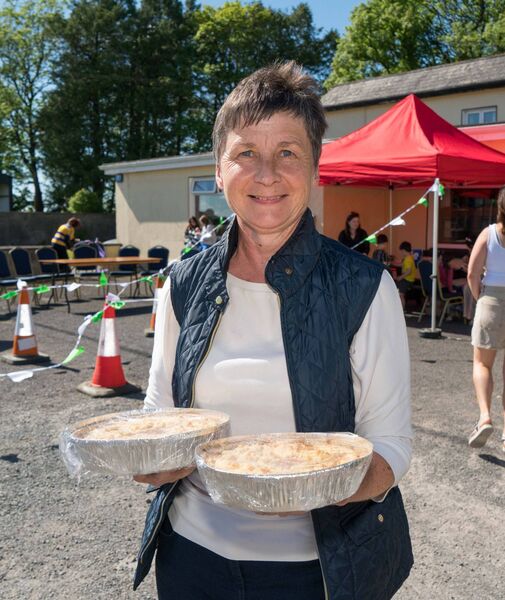 Ann Feeney bringing her home cooked rhubarb crumble to a community fundraiser in memory of Rita Sharkey. The family fun day and auction took place at The Four Provinces on Sunday last. Pic: Gerry Faughnan Ann Feeney bringing her home cooked rhubarb crumble to a community fundraiser in memory of Rita Sharkey. The family fun day and auction took place at The Four Provinces on Sunday last. Pic: Gerry Faughnan