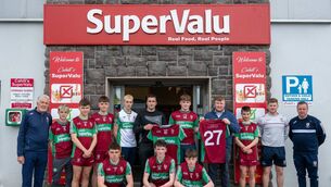 <p>Eoghan and Ronan Cahill of Cahill's SuperValu and Cahill's Paint &amp; DIY Centre presenting a set of sponsorship jerseys to the Castlerea St. Kevin's minor team. Also pictured are team managers and chairman of the Castlerea St. Kevin's Minor Club Vincent Finan. Pic: Breda Durr</p>