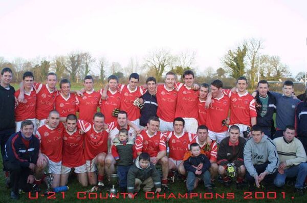 Eoin was an accomplished Gaelic footballer. Here, he is pictured fourth from right in the back row, with his Pádraig Pearses team-mates after winning an U-21 county championship in 2001. 