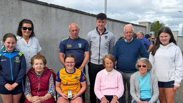 <p>All-Ireland handball champion, Niamh Hall, with members of her family, including her proud grandmother, Chrissie McLoughlin (sitting, far left), at Kilglass Gaels GAA grounds. </p>
