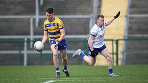 <p>Darragh Heneghan and Ryan McAnespie in action during the Division One Football League meeting between Roscommon and Monaghan in King and Moffatt Dr. Hyde Park earlier this year. Picture: Gerard O'Loughlin</p>
