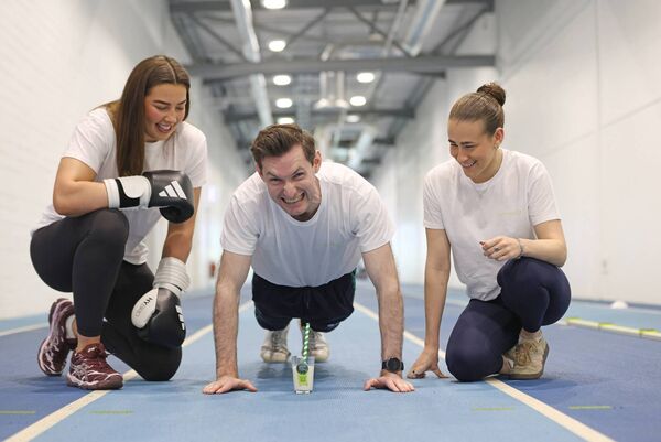 Double Olympic champion and three-time Olympic medallist rower Paul O’Donovan, pictured with World Champion boxer Lisa O’Rourke, and Paralympic silver medallist swimmer Róisín Ní Ríain.