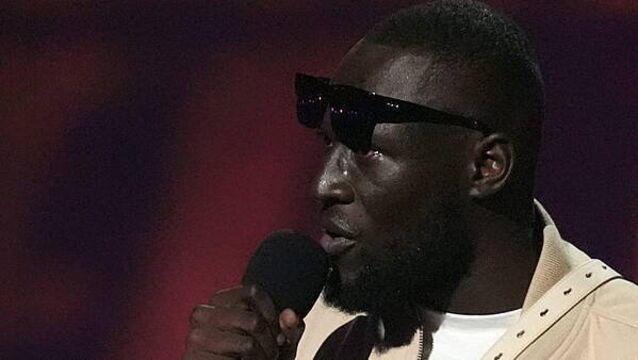 Stormzy fined for using phone while driving £400,000 Ferrari