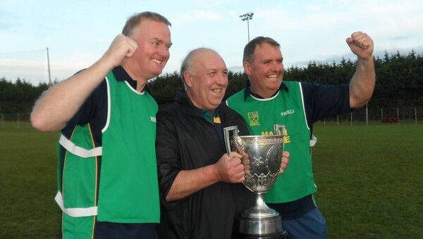 Harry Crowley was a member of the management team which guided Oran to its last senior hurling title in 2016. He is pictured on that memorable day with Colm Kelly and Francie Quine.