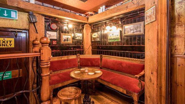 The interior décor features atmospheric lighting, and rich timber finishes throughout. 