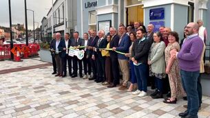 <p>Minister Dara Calleary cuts the ribbon on the newly refurbished Ballaghaderreen library. </p>