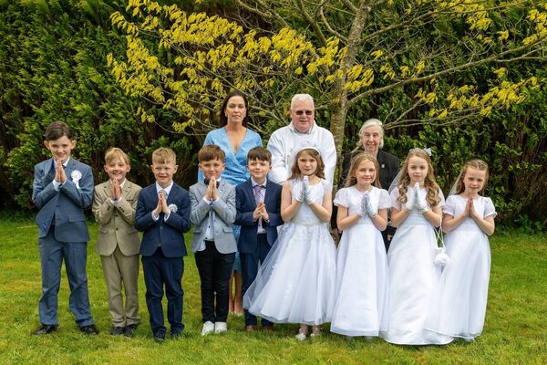 Children from Fairymount NS who recently received their First Holy Communion. They are pictured here with clergy and teachers. Pic: Breda Durr Children from Fairymount NS who recently received their First Holy Communion. They are pictured here with clergy and teachers. Pic: Breda Durr