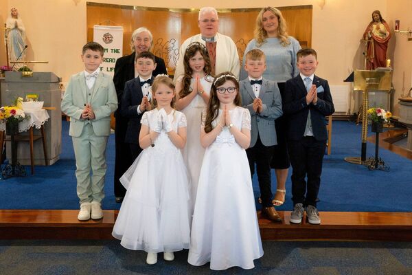 Children from Ballinagare NS who recently received their First Holy Communion. They are pictured here with clergy and teachers. Pic: Breda Durr Children from Ballinagare NS who recently received their First Holy Communion. They are pictured here with clergy and teachers. Pic: Breda Durr