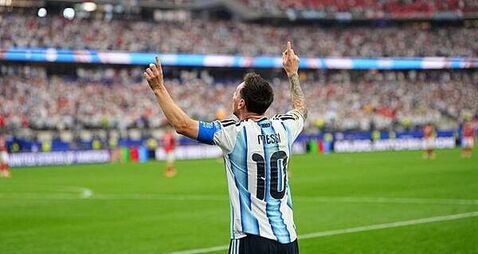 Record-breaking Lionel Messi scores twice as Argentina see off Austria