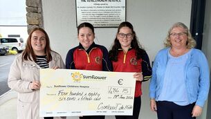 <p>Gaelscoil de hÍde, Roscommon The Student Council at Gaelscoil de hÍde, Roscommon recently organised a Jersey Day in aid of the Sunflower Children's Hospice, raising an impressive €486.15. Pictured at the cheque presentation are (l to r) Susan Gaynor, Mayo Roscommon Hospice Foundation, Robyn Nic Raghnaill, Aisling Nic an Ultaigh and Múinteoir Eanna. Go raibh míle maith agaibh to all the students and staff for their wonderful support. </p>