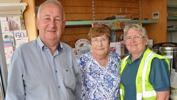Cllr Michael Holland and Patsy Kelly, An Post, with Mary Lennon on her last day at Ballintubber Post Office. Pic: Liam Reynolds