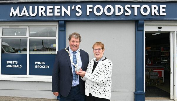 Maureen Kenny with the Cathaoirleach of Roscommon County Council, Cllr Dominick Connolly, as she retires from the shop she has run in Ballyforan, Maureen's Foostore, for the past 57 years. Pic: Gerard O'Loughlin Maureen Kenny with the Cathaoirleach of Roscommon County Council, Cllr Dominick Connolly, as she retires from the shop she has run in Ballyforan, Maureen's Foostore, for the past 57 years. Pic: Gerard O'Loughlin