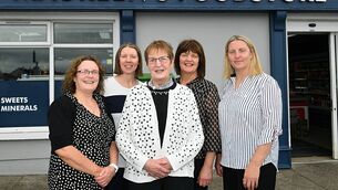 <p>Members of the Kenny family, Linda, Marie, Yvonne and Cáit with Maureen as she retires from the shop she has run in Ballyforan, Maureen's Foostore, for the past 57 years. Pic: Gerard O'Loughlin</p>