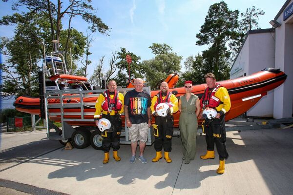 John Tunney who was rescued from the river Shannon by Lynda Jones with RNLI crew, Paul Kelly, Kevin Devlin and Stan Bradbury at the Loughrea life boat station in Cooasan Point, Athlone. Photo Paul Molloy. 