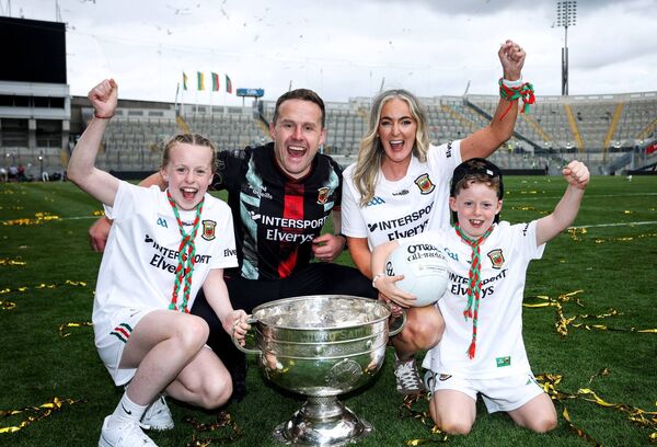 Mayo senior football manager Andy Moran, with his wife Jennifer, daughter Charlotte and son Ollie, and the Sam Maguire Cup, in the aftermath of his side's famous All-Ireland Senior Football Championship final victory on Sunday last. Picture: INPHO/Tom Maher Mayo senior football manager Andy Moran, with his wife Jennifer, daughter Charlotte and son Ollie, and the Sam Maguire Cup, in the aftermath of his side's famous All-Ireland Senior Football Championship final victory on Sunday last. Picture: INPHO/Tom Maher