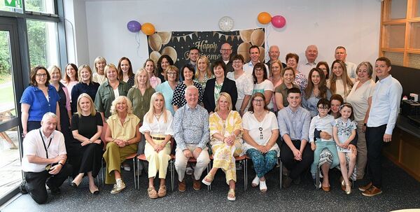 John Hanily (centre) pictured with family, friends and colleagues at a coffee morning to mark his retirement after 45 years. Pic: Gerard O’Loughlin John Hanily (centre) pictured with family, friends and colleagues at a coffee morning to mark his retirement after 45 years. Pic: Gerard O’Loughlin