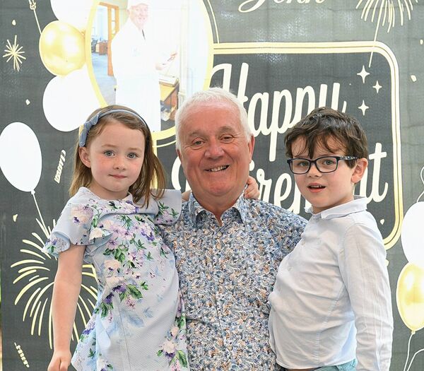 John Hanily with his grandchildren Felicity and Marcus Hanily on his retirement from the HSE after 45 years. Pic: Gerard O’Loughlin John Hanily with his grandchildren Felicity and Marcus Hanily on his retirement from the HSE after 45 years. Pic: Gerard O’Loughlin