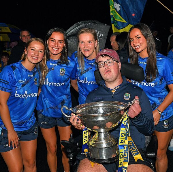 Megan McKeon, Ria Lennon, Helena Cummins, and Saoirse Wynne with Adam Reddington and the Mary Quinn Cup at the homecoming celebrations for the All-Ireland winning Roscommon intermediate ladies' footballers in Hannon's Hotel, Roscommon Town, on Sunday evening. Pic: Gerard O'Loughlin Megan McKeon, Ria Lennon, Helena Cummins, and Saoirse Wynne with Adam Reddington and the Mary Quinn Cup at the homecoming celebrations for the All-Ireland winning Roscommon intermediate ladies' footballers in Hannon's Hotel, Roscommon Town, on Sunday evening. Pic: Gerard O'Loughlin