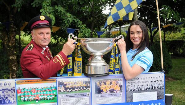 Richard Thompson, Castlerea Brass and Reed Band with his daughter Ella, a member of the Roscommon All-Ireland winning Intermediate team, at the Fairymount Memorial Garden where Roscommon’s All-Ireland-winning teams have been honoured as part of a unique Wall of Fame. Pic: Liam Reynolds