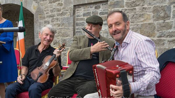 Gene Anderson, George Eggleston, Elphin and Deasún Lyons had the honour of playing music for Uachtarán na hÉireann, Catherine Connolly, on her recent visit to Carrick-on-Shannon. Pic: Gerry Faughnan 