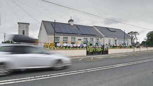 <p>Children attending Cloverhill NS made their point as traffic passed the school. Pic: Gerard O'Loughlin</p>