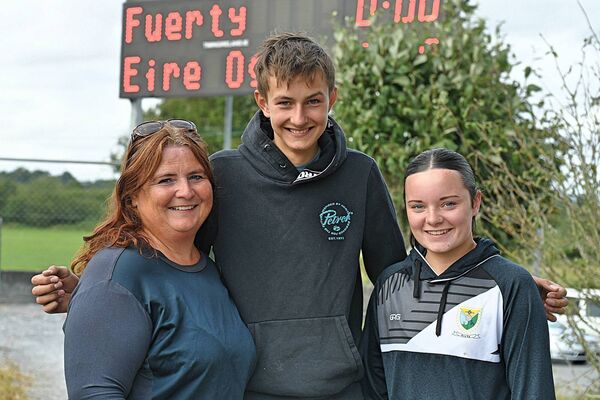 Éire Óg supporters, Breege and Grace Corrigan, with Clemens Breyhan, getting behind their team during the recent intermediate football championship game against Fuerty. Pic: Gerard O'Loughlin