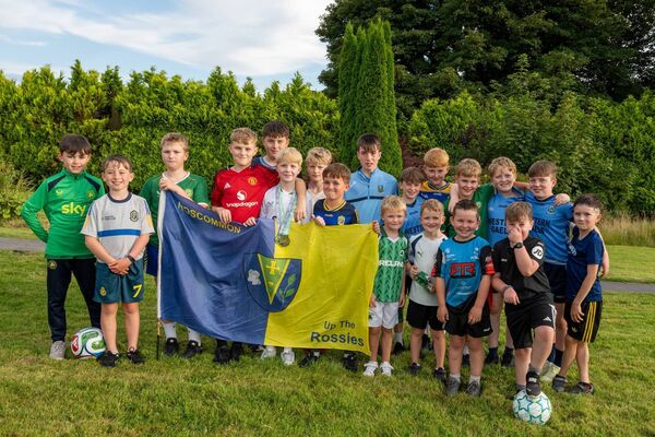 Donnacha Horan surrounded by his delighted friends. Pic: Breda Durr