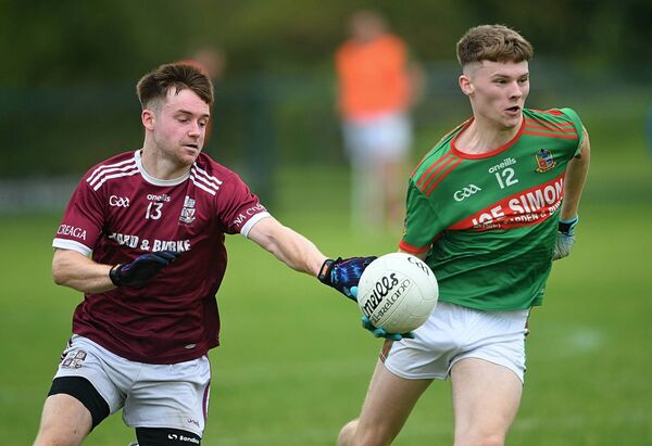 St. Michael's wing-forward, Alex Oates, seen here taking possession away from Creggs' Matthew Browne, will be hoping that his team can record a hat-trick of intermediate football championship victories, and subsequently top their group, in Saturday's North Roscommon derby against Shannon Gaels at Ardcarne Park. Picture: Gerard O'Loughlin St. Michael's wing-forward, Alex Oates, seen here taking possession away from Creggs' Matthew Browne, will be hoping that his team can record a hat-trick of intermediate football championship victories, and subsequently top their group, in Saturday's North Roscommon derby against Shannon Gaels at Ardcarne Park. Picture: Gerard O'Loughlin