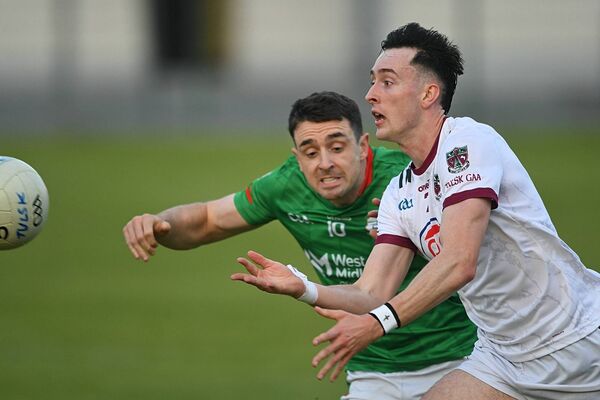 John Cunningham tries to prevent Dylan Gaughan from getting his pass away during Friday evening's intermediate football championship game between St. Brigid's and Tulsk in Ballyforan. Picture: Gerard O'Loughlin John Cunningham tries to prevent Dylan Gaughan from getting his pass away during Friday evening's intermediate football championship game between St. Brigid's and Tulsk in Ballyforan. Picture: Gerard O'Loughlin