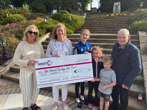 Members of Keadue Tidy Town's presenting a cheque for €400 to Marie Casey, Sligo Oncology Unit Trust. The monies raised came from a recent fundraising walk.