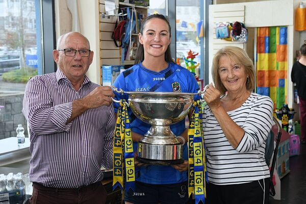 Aidan and Mary McKenna, Monksland, pictured with Jenny Higgins and the Mary Quinn cup, when Jenny visited the Jack & Jill charity shop in Roscommon Town. Pic: Ger O'Loughglin Aidan and Mary McKenna, Monksland, pictured with Jenny Higgins and the Mary Quinn cup, when Jenny visited the Jack & Jill charity shop in Roscommon Town. Pic: Ger O'Loughglin