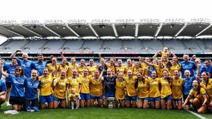 <p>The Roscommon intermediate ladies' football panel and management team, with the Mary Quinn Memorial Cup, following their 2-12 to 0-6 victory against Fermanagh in the All-Ireland final at Croke Park. Pic: INPHO/Ben Brady</p> <p>The Roscommon intermediate ladies' football panel and management team, with the Mary Quinn Memorial Cup, following their 2-12 to 0-6 victory against Fermanagh in the All-Ireland final at Croke Park. Pic: INPHO/Ben Brady</p>