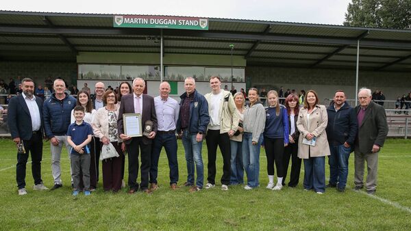 PROUD MOMENT: Martin Duggan with his family and friends at the official naming of the Martin Duggan Stand at O'Rourke Park on Saturday last. Also pictured are Castlerea St. Kevin's Chairperson John Murphy and Club President Eamon Campion. Pictures: Bernie O'Farrell PROUD MOMENT: Martin Duggan with his family and friends at the official naming of the Martin Duggan Stand at O'Rourke Park on Saturday last. Also pictured are Castlerea St. Kevin's Chairperson John Murphy and Club President Eamon Campion. Pictures: Bernie O'Farrell