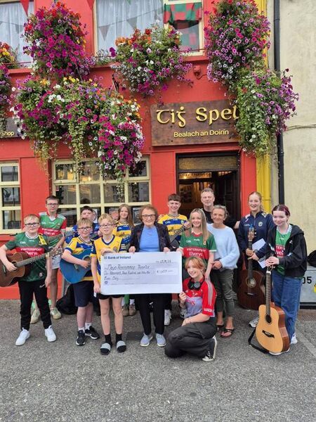 Local musicians make a donation to Kathleen Rushe on behalf of Roscommon/Mayo Hospice. Local musicians make a donation to Kathleen Rushe on behalf of Roscommon/Mayo Hospice.