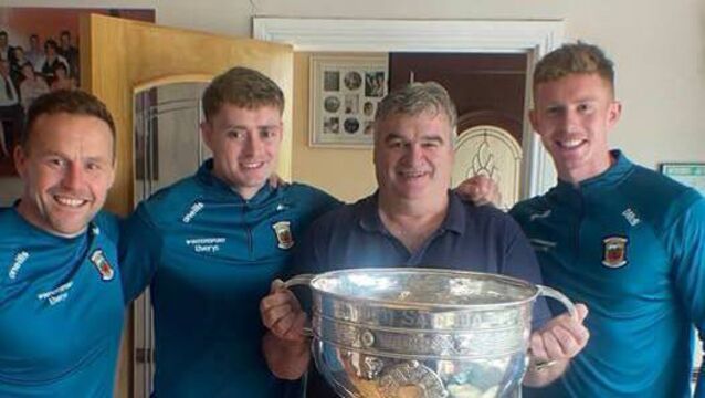 <p>Noel Durkin with the Sam Maguire Cup alongside Andy Moran, Kuba Callaghan and David McBrien. Picture: Ballaghaderreen GAA Club</p>