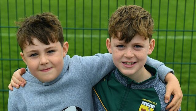 <p>Lachan and Ryan Lynch, from Shannon Gaels, supporting the North Roscommon senior footballers during their preliminary championship quarter-final against Roscommon Gaels in Strokestown. Picture: Gerard O'Loughlin</p>