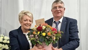 <p>Martin Higgins, chairman Castlerea Mart making a presentation to Siobhan Earley. Pic: Liam Reynolds</p>